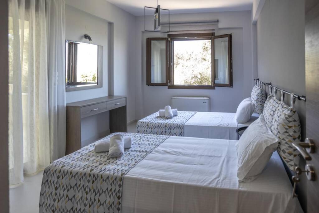 Mela Luxury Apartments Maroulás Esterno foto