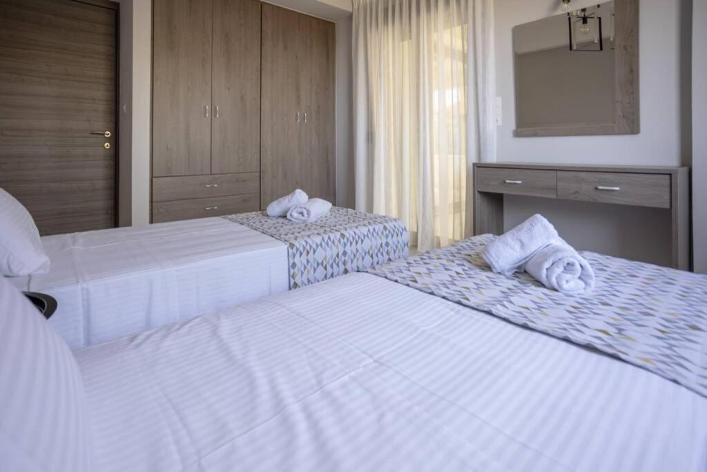 Mela Luxury Apartments Maroulás Esterno foto