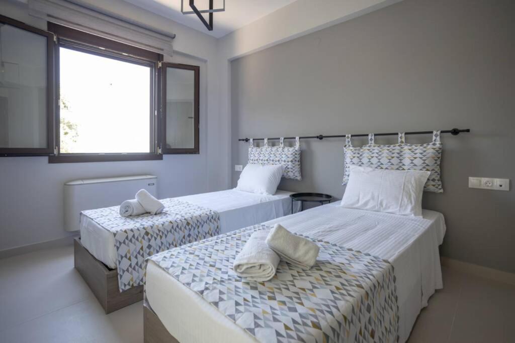 Mela Luxury Apartments Maroulás Esterno foto