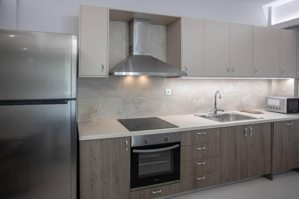 Mela Luxury Apartments Maroulás Esterno foto